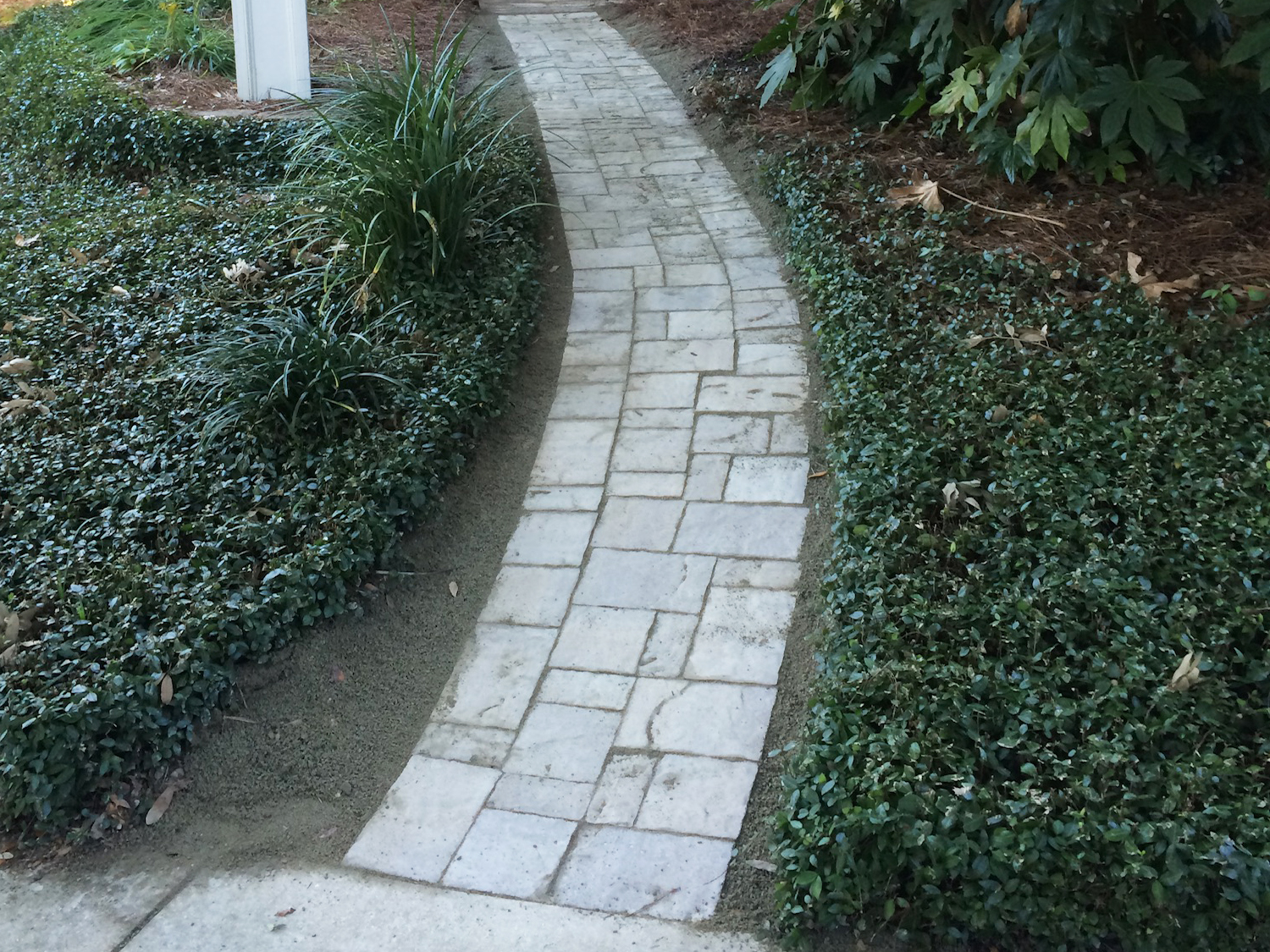 thin square stonework pathway